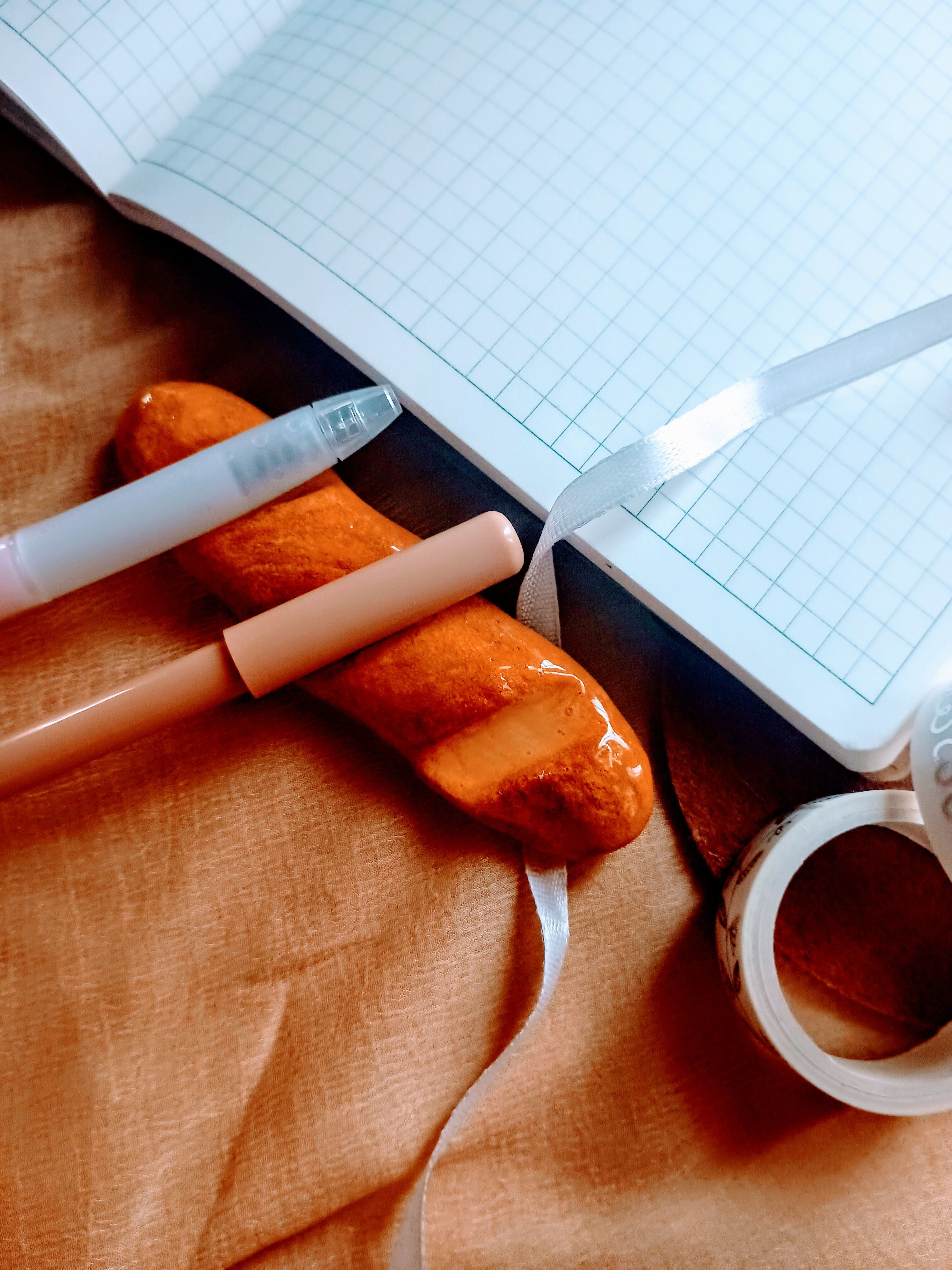  air dry clay pen rest in the shape baguette bread.