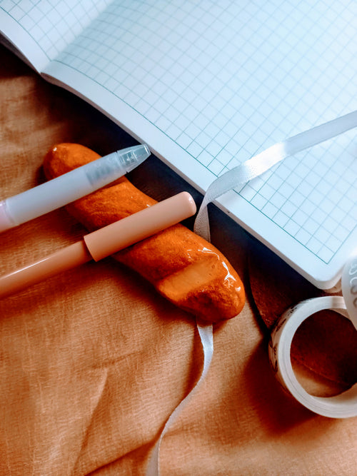  air dry clay pen rest in the shape baguette bread.