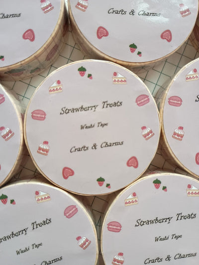 Washi tape labeled 'Strwberry Treats' with cute illustrations of straberry desserts on top  a book