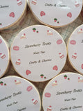Washi tape labeled 'Strwberry Treats' with cute illustrations of straberry desserts on top  a book