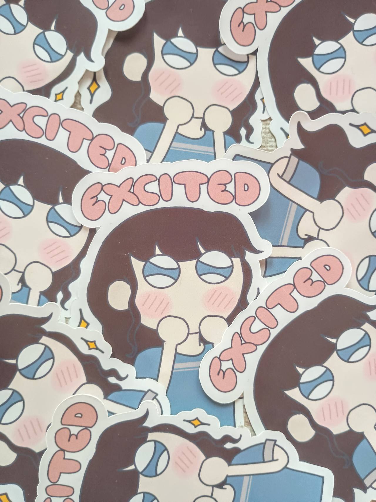 a bunch of sticker with girl in t-shirt in anime style art with an excited expression. the pink text on the sticker says exicited.