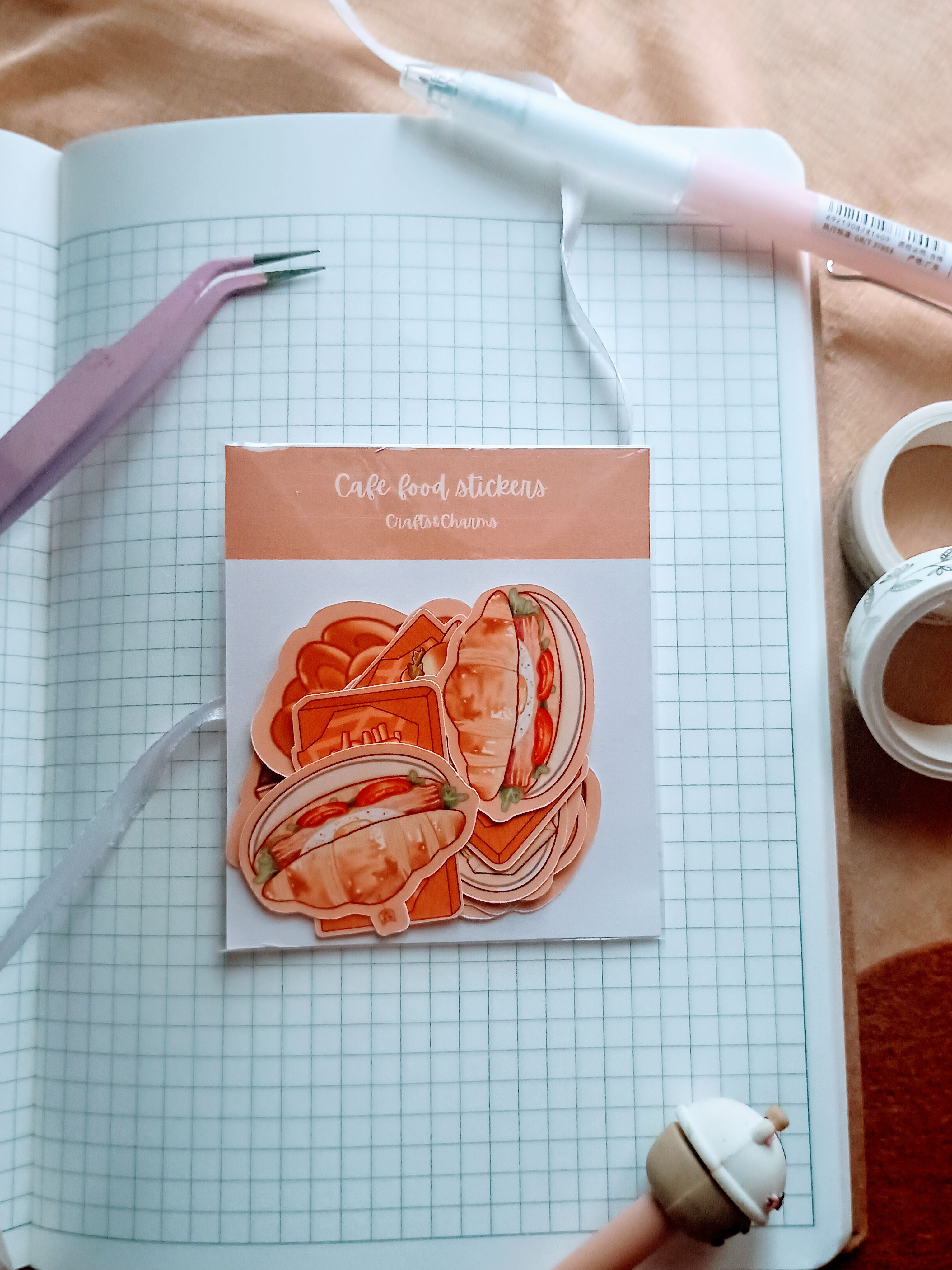 Pack of cafe food stickers with burger and fries, americano, latte, croissant sandwitch, egg sandwitch, onion ings, potato wedges and carbonara with garlic bread on notebook 