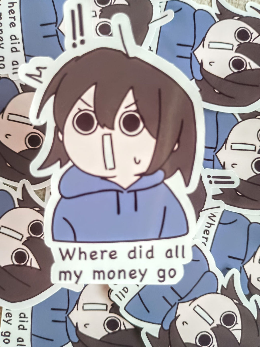 anime style girl with suprised face with text 'Where did all my money go' surrounded by various stickers of same kind